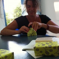 Thanks to Kate, who slaved for days to help us wrap nearly 3,000 bars of soap.